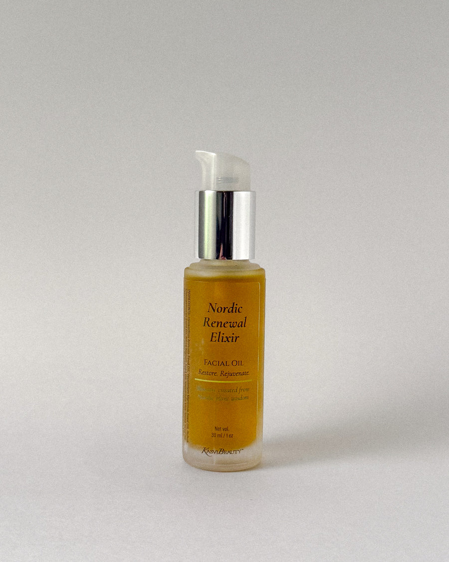 Bottle of Nordic Renewal Elixir facial oil on a light gray background